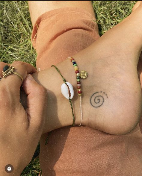 Spiral Ankle Tattoo, Don’t Trip Tattoo, Lower Neck Tattoo Women, Small Hippie Tattoo, Spiral Tattoo Ideas, Small Earthy Tattoos, Bellbottoms 70s, Spiral Tattoo, Body Positive Art