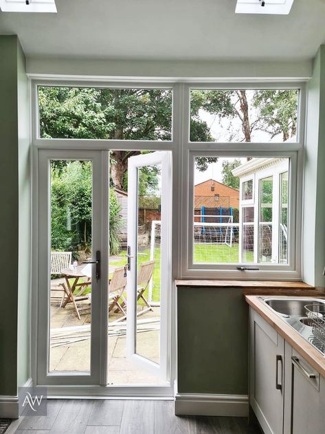 Outswing French Doors With Screens, Window Next To French Doors, Back Door And Window Ideas, Kitchen French Windows, Kitchen With Side Window, Small Kitchen With French Doors To Patio, Glass Door With Windows On Side, Doors In Kitchen To Outside, Backdoor In Kitchen