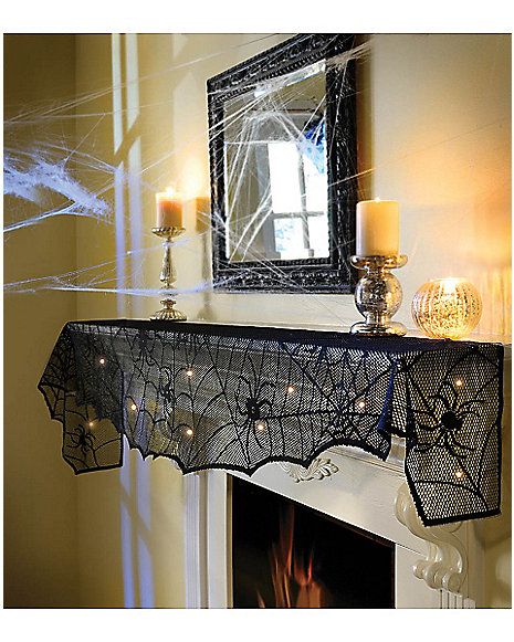 Spider Mantel Cover  - Spirithalloween.com   The lighted fabric resembles spider webs with just the right amount of ambiance. Halloween Mantel Decor, Mantle Scarf, Orange Led Lights, Halloween Lights Decorations, Halloween Tricks, Halloween String Lights, Halloween Mantle, Halloween Themed Wedding, Halloween Mantel