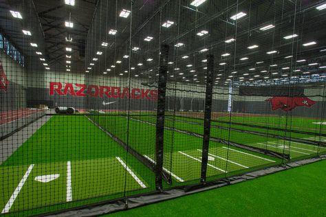 Indoor Batting Cage Ideas, Indoor Softball Facility, Baseball Facility Design, Baseball Cages Indoor, Baseball Facility, Indoor Baseball Facility, Building A Batting Cage, Baseball Training Facility, High School In America