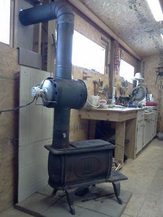 I wanted to build this heat exchanger to reclaim some of the heat that is lost up the chimney of my wood stove. I use the wood stove to heat my workshop during the winter months . I have seen heat exchanger units available in stores for around $160. Since I'm cheap, and I hate to pay money for things that I think I can build myself,  I set out to create my own heat  exchanger. Diy Wood Burning Stove, Diy Wood Burning, Wood Stove Installation, Wood Burner Stove, Wood Stove Heater, Diy Wood Stove, Stove Installation, Alternative Living, Wood Heat