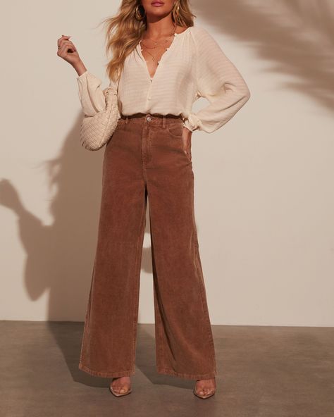 Introducing the Sophia Wide Leg Pants—where romance meets effortless chic. Made from luxe corduroy, these pants drape beautifully with their wide-leg silhouette, offering a blend of sophistication and comfort. The classic 5-pocket styling adds a practical touch while maintaining a polished look. Pair with a delicate blouse for a refined day look or dress up with a statement top for evening allure. Runs large, consider sizing down Corduroy fabric 5-pocket styling Zip fly with button closure 75% C How To Style Corduroy Pants, Wide Leg Dress Pants Outfit, Wide Leg Pants Street Style, Buisness Attire, Brown Pants Outfit, Cute Business Casual, Corduroy Pants Outfit, Style Wide Leg Pants, Winter Pants Outfit