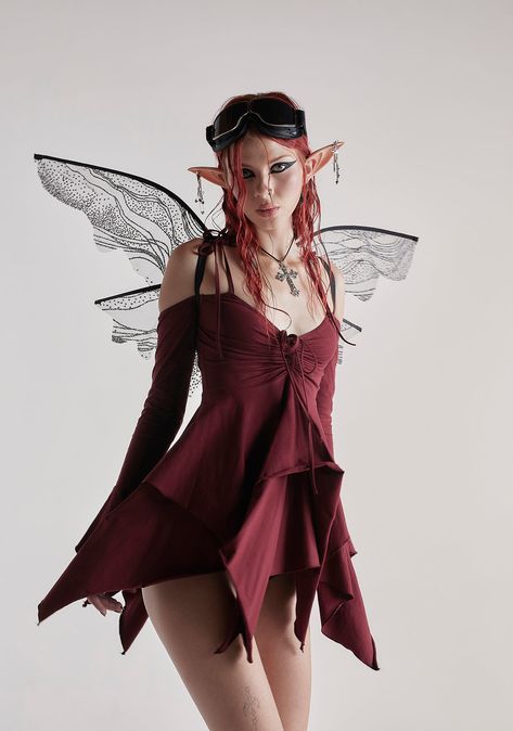 and fairies only. This mini dress comes with off the shoulder sleeves, spaghetti straps with tie closures, ruching at the chest with a tie closure, and a handkerchief detail, hem, and cuffs. Fallen Fairy Costume, Red Fairy Outfit, Red Fairy Costume, Fire Fairy Costume, Fey Fashion, Fairies Halloween, Fairy Costume Halloween, Dark Fairy Costume, Fae Costume