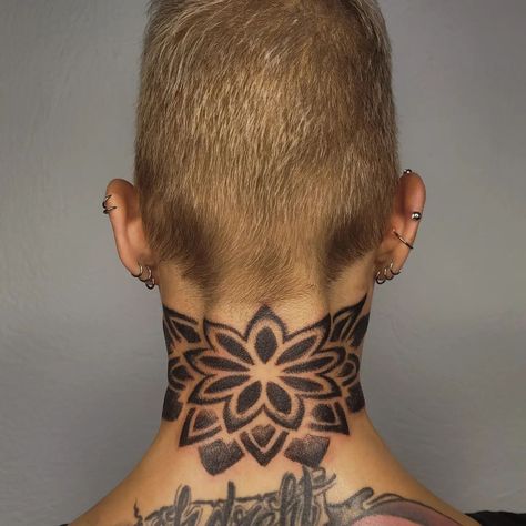 As you know, mandala represents the universe in Hindu and  Buddhist symbolism. A detailed mandala tattoo on your neck represents that we live in a universe of perfection. Back Neck Tattoo Mandala, Upper Neck Tattoo, Mandala Tattoo Neck, Back Of Neck Tattoo Men, Wing Neck Tattoo, Buddhist Symbolism, Neck Tats, Flower Neck Tattoo, Mandala Tattoo Men