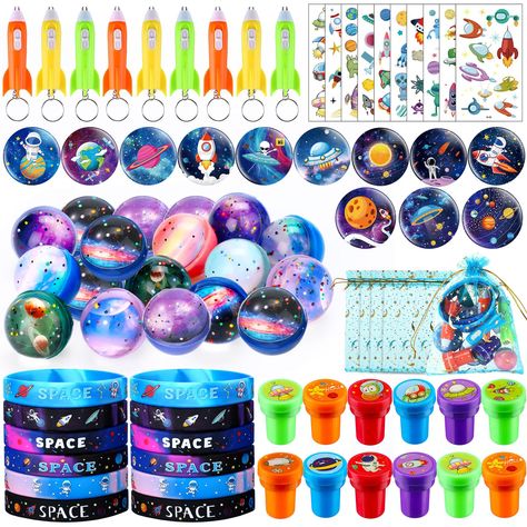 PRICES MAY VARY. Outer Space Themed Party Favors: you will get 12 space bouncy balls, 12 space birthday silicone bracelets, 12 space button pins, 12 space birthday tattoos, 12 galaxy rocket light key chains, 12 planet birthday stamps and 12 organza drawstring bags; Let your family enjoy a nice outer space party with their partners Ideal Party Favor Gifts: the space bag fillers can be divided into 12 pieces of gift bags, which are suitable birthday goodie bags, school classroom rewards, party ite Space Themed Birthday Party Favors, Space Birthday Party Food, Outer Space Party Favors, Space Birthday Party Ideas, Planets Birthday, Science Party Favors, Birthday Classroom, Space Party Favors, Birthday Tattoos