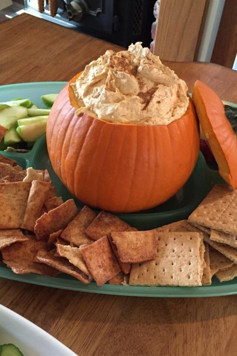 Pumpkin Fluff Dip | "I made this for a fall harvest party. Everyone loved it." #potluckrecipes #partyappetizers #cookoutrecipes #picnicfood #picnicideas #potluckdesserts #dessertrecipes #dessertideas Food To Bring To Thanksgiving, Bonfire Party Dips, Pumpkin Dip In A Pumpkin, Essen, Fall Food For Parties, Halloween Harvest Party, Best Fall Party Dips, Fall Festival Foods Ideas, Fall Birthday Snack Ideas