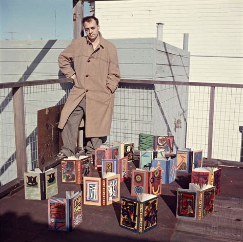 Kenneth Patchen in 1957 with a collection of his painted books. The photograph was taken by the late photographer Harry Redl on the rooftop of his apartment house in San Francisco. Fine Art Photography, Writers, Art Sketchbook, Writers And Poets, Kenneth Patchen, Super Man, Apartment House, Painted Books, Concept Design