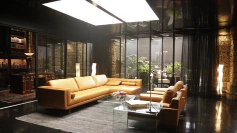 Orange leather sectional sofa, glass coffee tables and Artemide Tolomeo table lamps. Lucifer Penthouse, Lucifer Design, Lucifer Aesthetic, Classy Goth, Penthouse Interior, Dining Lounge, Lucifer Morningstar, Bachelor Pad, Interior Design Tips