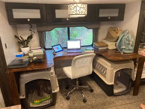 home office space in rv with kennel for dogs Rv Kennel Ideas, Camper Renovation With Dogs, Dog Crate Under Bed In Camper, Camper Pet Ideas, Dog Kennel Camper Ideas, Office In Camper, Skoolie Office Space, Office With Dog Space, Dog Friendly Rv Remodel