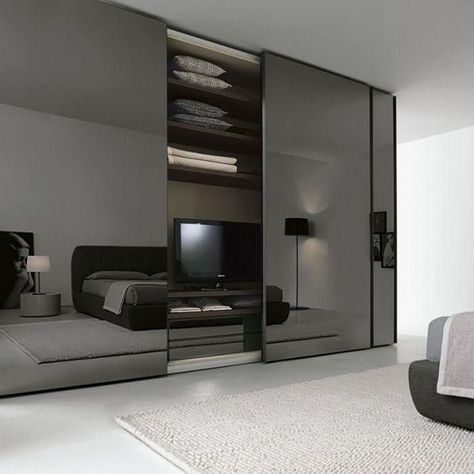 Trend Alert: Smoked Glass - FADS BlogFADS Blog Mirrored Walls, Mirrored Wardrobe Doors, Sliding Door Design, Wardrobe Door Designs, Sliding Wardrobe Doors, Bedroom Closet Design, Wardrobe Design Bedroom, Mirrored Wardrobe, Sliding Doors Interior