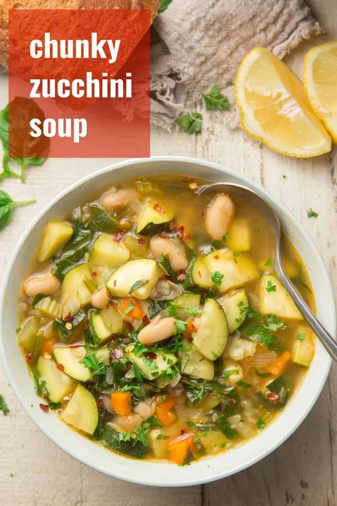 Got zucchini to use up? Make this zucchini soup! It's full of flavor, and packed with chunks of zucchini, carrots, white beans and spinach. Easy, healthy, vegan and gluten-free! #vegansoup #zucchinirecipes #healthyrecipes Creamy Zucchini Soup, Zucchini Soup Recipes, Recipes Zucchini, How To Cook Zucchini, Zucchini Soup, Healthy Zucchini, Chicken Zucchini, Vegan Soup Recipes, Vegetable Soup Recipes