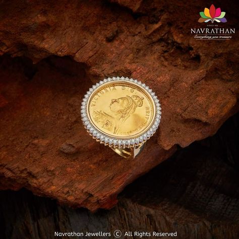 A regular gold coin ring is ornamented with diamonds. Its fine craftsmanship and the art of fine jewellery are reminiscent of a bygone era. It is specially created to suit and delight you. Walk into our stores and experience its pulse quickening design a treasure with thrilling craftsmanship and grab this Ginni Diamond Ring before it goes off the shelf or visit us at www.navrathan.com and get it immediately.  #Jewellery #Navrathan #Jewellers #Gold #Silver #Diamond #GoldNecklaceDesign #SilverArti Gini Ring In Gold, Ginni Necklace Design, Ginni Jewellery Design, Gold Coin Pendant Designs, Ginni Ring Designs Gold, Ginni Pendant Design, Ginni Pendant Design Diamond, Coin Rings Women, Ginni Ring