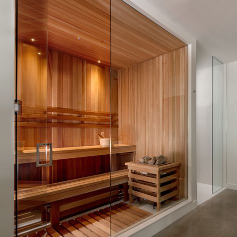 This modern bathroom is designed with a built in sauna using cedar cladding and full height glass enclosure.  By: Trevor McIvor Architect  #modernbathroomdesign #sauna #muskokacottage #modernbathroom Nordic Sauna, Wellness Bathroom, Basement Sauna, Sauna Bathroom Design, Sauna Bathroom, Home Spa Room, Sauna Diy, Indoor Sauna, Cedar Cladding