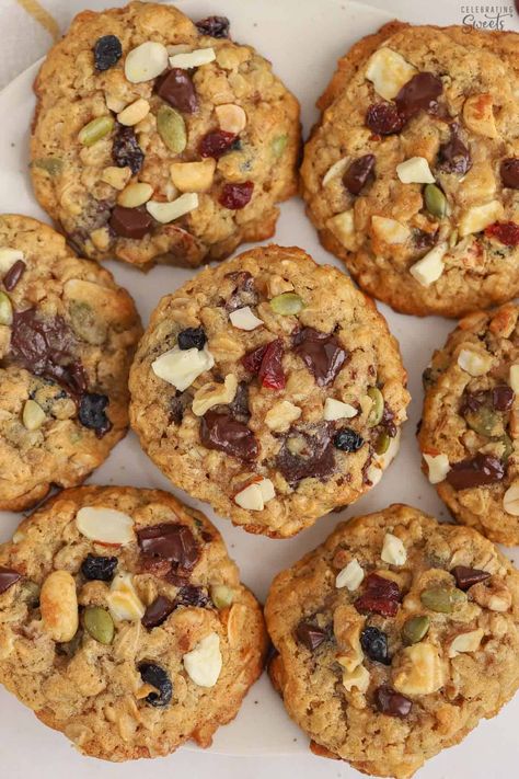 These soft and chewy Trail Mix Cookies are loaded with oats, nuts, seeds, dried fruit, and chocolate chips. Trail Mix Cookies Healthy, Fruit And Nut Cookies, Dried Fruit And Nut Mix Recipes, Cookies With Dried Fruit, Dried Fruit Cookies Recipe, Trail Mix Cookies Recipe, Granola Cookies Recipe, Dried Fruit Cookies, Snack Diet