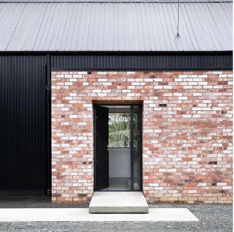 i show a lot of our recycled brick but a lot of our exterior also features colourbond cladding in matt monument..cant wait for this area to… Red Architecture, Modern Brick House, Brick House Designs, Recycled Brick, House Cladding, Metal Cladding, Reclaimed Brick, Black Barn, Modern Barn House