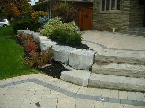 landscaping with armour stone Armour Stone Garden Edging, Armour Stone Garden, Armour Stone Landscaping, Stone Garden Ideas, Landscaping Steps, Landscaping Entryway, Boulder Steps, Lake House Patio, Landscaping House