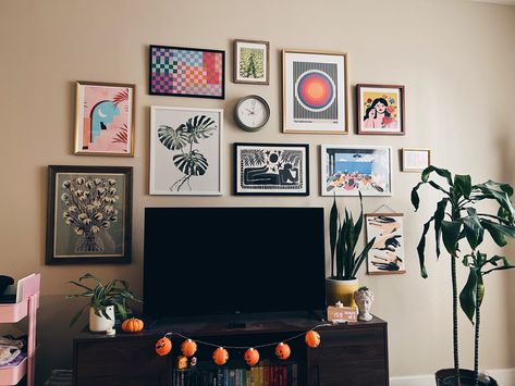 my gallery wall around my tv <3 still decorated partially for halloween lol Gallery Wall Over Tv Stand, Gallery Wall Next To Tv, Gallery Wall Over Tv, What To Put Above Tv, Gallery Wall Above Tv, Gallery Wall Behind Tv, Gallery Wall With Tv, Gallery Wall Around Tv, Tv Gallery Wall Ideas