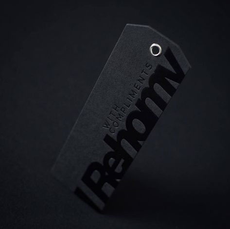 Hangtag with steel rivet. Black foil on black paper. Part of luxury packaging bundle. Produce by www.elegantepress.com Black Tag Design, Price Tag Design, Modern Packaging Design, Packaging Stationery, Watch Packaging, Brochure Design Layouts, Jeans Label, Custom Hang Tags, Clothing Labels Design