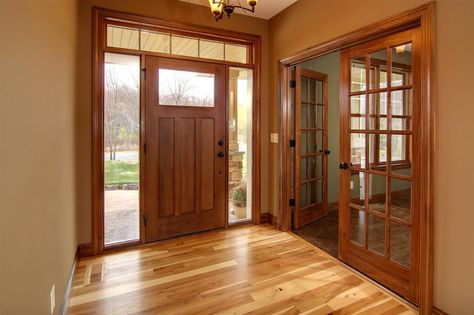 The dark wood trim accents tie in beautifully with the various colors in the hickory floor. Description from pinterest.com. I searched for this on bing.com/images Farmhouse Trim Moldings, Painted Interior Door, Painting Wood Trim, Stained Wood Trim, Natural Wood Trim, Oak Wood Trim, Interior Door Colors, Farmhouse Trim, Dark Wood Trim