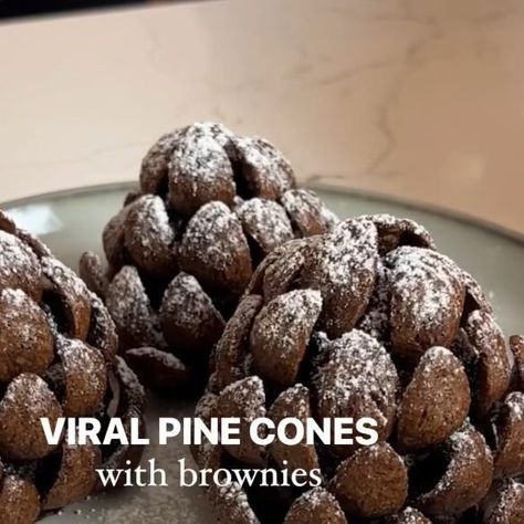 Georgina Thomas on Instagram: "Viral brownies pine cones! I had to jump on this trend and make the famous pine cones but with a gooey brownie centre using my brownies recipe. If you have any leftover brownies then this is such a cute idea for the holidays ✨🤎 Ingredients 9 brownies (see recipe on my page) Chocolate curl cereal 1-2 tbsp icing sugar Instructions 1. Make brownies (use my recipe on my profile- 2 posts down) or buy brownies! 2. Squeeze them together to form a pine cone shape. Around 9 brownies should make 6 cones. 3. Use as much cereal as you need to surround the brownie pine cones. This takes a while so be persistent! 4. Sieve with icing sugar and enjoy! #pinecones #pine #viral #chocolatebrownies #brownies #christmas #christmasdessert #holidays" Pine Cone Brownies, Brownie Pinecones, Pinecone Brownies, Leftover Brownies, Pinecone Cookie, Pinecone Cookies, Brownies Christmas, Christmas Brownie, Christmas Bakes