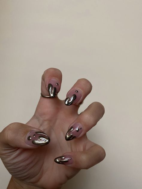 Picture of almond-shaped acrylic nails with silver drippy tips Silver Metal Nail Art, Chrome Drip French Tip Nails, Silver Chrome Nails Ideas, Melted Silver Nails, Silver Bubble Nails, Drippy Chrome Nails, Metallic Silver Nails Art Designs, Melting Metal Nails, Silver Blob Nails