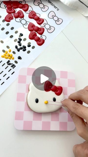 Jenny on Instagram: "💕using icing transfers to decorate this hello kitty cookie instead of piping them directly onto the cookie!  This helps me with cratering, and also allows me to skip using my projector! You can also make the transfers way in advance so it can help cut down decorating time ^^   #sugarcookies #cookiedecorating #baking #dessert #decoratedcookies #cookies #satisfying #hellokitty #sanrio #hellokittylover #sanriocore" Hello Kitty Oreos, How To Decorate Cookies, Decorate Cookies, Hello Kitty Sugar Cookies, Hello Kitty Desserts, Hello Kitty Cookies Decorated, Sanrio Cookies, Hello Kitty Cookies Royal Icing, Hello Kitty Treats Sweets