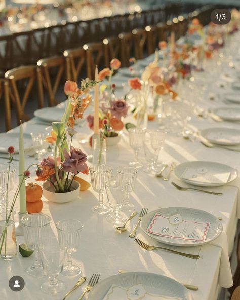 Colorful Table Linens Wedding, Coloured Glass Wedding Table, Circle Table Wedding Decor Colorful, Italian Long Lunch Table Setting, Floral Frog, Pastel Wildflower Wedding Table, Bright Floral Wedding Table Settings, Wedding Table Setup, Backyard Dinner Party