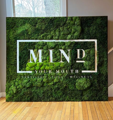 Moss Wall Backdrop, Accent Wall With Business Logo, Moss Accent Wall, Logo On Wall Ideas, Moss Wall With Logo, Moss Interior Design, Moss Logo Design, Green Wall With Logo, Instagrammable Walls Interior