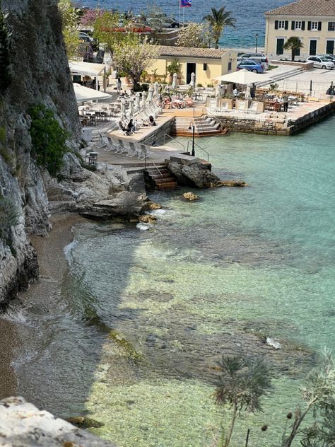 greece island corfu crystal clear water rocky coast Greek Coast Aesthetic, Greek City Aesthetic, Greece Aestethic, Greek Islands Aesthetic, Corfu Greece Aesthetic, Greece Coast, Greek Island Aesthetic, Greek Coast, Ancient Greece Aesthetic