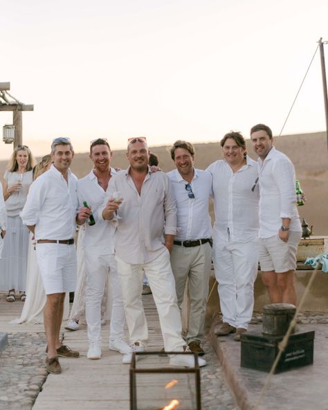 An unforgettable welcome party we created in the middle of a desert with an all white dress code, celebrating the arrival of guests to Morocco for a multi day wedding following a more intimate roof top gathering in the medina. With poolside drinks as the sun set, and a spectacular dining experience under the stars surrounding my thousands of candles, before a live fire show and music to dance around the fire pits. 📷 @katiejulia_ #destinationwedding #partyplanner #weddingplanner #weddingin... White Dress Code Party, All White Dress Code, Multi Day Wedding, All White Dress, Poolside Drinks, Party Dress Codes, Welcome Party, Moroccan Wedding, Welcome Drink