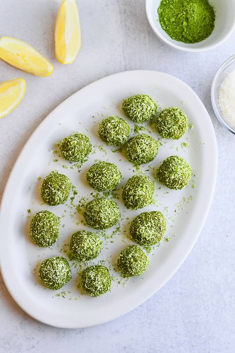 These Coconut Matcha Protein Balls are a delicious high protein, low carb snack. It's an easy, no bake recipe featuring sweet coconut, matcha and creamy cashew or sunflower butter.  The matcha provides an added boost of energy and nutritional benefits. Vegan, paleo, gluten free, low sugar. Coconut Protein Balls, Matcha Energy Balls, Coconut Matcha, No Bake Recipe, Protein Balls Recipes, Coconut Protein, Sunflower Butter, The Matcha, Low Carb Snack