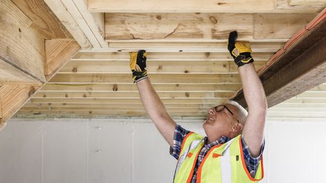 9 Genius Exposed Basement Ceiling Ideas To Make Your Space Look Intentional - House Digest Open Joist Basement Ceiling, Cheap Ceiling Ideas Diy Basement, Ceiling Joists Framing, Stained Basement Ceiling, Accessible Basement Ceiling, Basement Ceiling Storage Ideas, Plywood Drop Ceiling, Accessible Basement Ceiling Ideas, Finished Basement With Exposed Ceiling