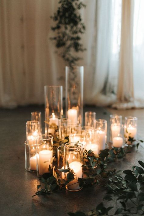 Simple white candles in glass vases added a warm touch to this indoor ceremony | Image by Gallivan Photo White Candles Wedding, Wedding Candles Table, Wedding Ceremony Ideas, Nye Wedding, Candle Wedding Decor, Indoor Ceremony, Wedding Winter, Wedding Ceremony Decorations, Indoor Wedding