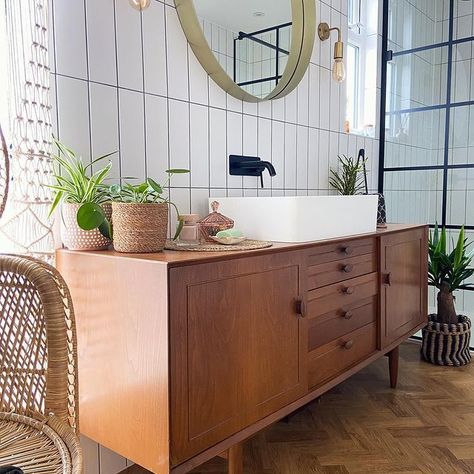 We are in awe of this bathroom design. The use of a vintage 1960s Scandart sideboard transforms the bathroom into something so charming and unique. It's such a brilliant way to upcycle furniture, bringing both style and functionality to the space. Design and Image Credit | Laura - Instagram @leopard_print_stairs #sideboardbasins #scandartsideboard #modernbathroom #bathroom #bathrooms #bathroomideas #interiordesign #designinspiration #bathroomsofinsta #bathroomsofinstagram #bathroomremodel Bathroom Ideas Wooden Tiles, Bathroom Flooring Ideas Herringbone, Wooden Floors Bathroom, Wood Herringbone Floor Bathroom, Bathroom With Wooden Floor Tiles, Wooden Floor Bathroom Ideas, Herringbone Wood Floor Bathroom, Wood Look Tile Floor Bathroom, Wood Tile Floor Bathroom