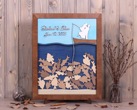 Wedding Drop box Couple on a Boat Custom frame 3d Wood drop river wedding ideas river Fishing Wood Custom frame 3d Unique wedding sign This drop box wedding guestbook, a beautiful guest book alternative that is fun for you and your guest. Your guests sign and drop the pieces into the frame and then you can actually hang it in your home to enjoy for years to come. You will always remember who shared in your wedding day with you and spouse. We are happy to customize the colors of the guest book fo Fishing Engagement Party, Fishing Wedding Ideas, River Wedding Ideas, Couple On A Boat, Fishing Themed Wedding, Wedding Secrets, Wedding Drop Box, Unique Wedding Signs, River Wedding