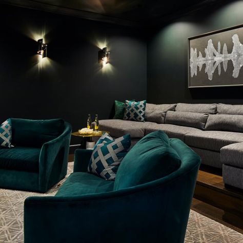 Custom Home Theater with Deep Green Walls | HGTV Teal Media Room, Theater Style Living Room, Home Movie Theater Room Wall Colors, Dark Green Home Theater, Green Home Theater, Forest Green Media Room, Green Cinema Room, Home Theatre Seat Ideas, Dark Green Theater Room