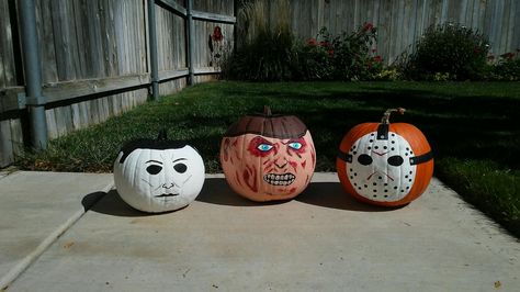 Jason, Freddy and Michael pumpkins Freddy Pumpkin Painting, Micheal Myers Pumpkin Painting Ideas, Horror Painting Pumpkin, Jason Painted Pumpkin, Michael Myers Painted Pumpkin, Scary Punkin Painting, Scary Pumpkin Painting Ideas Creative, Michael Myers Pumpkin Painting, Freddy Krueger Pumpkin Painting