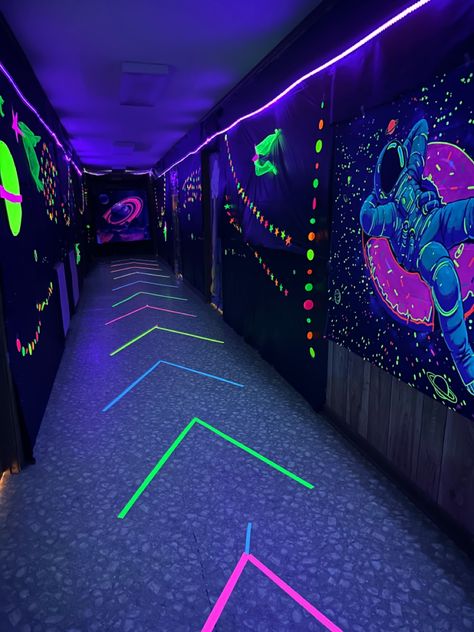 Blacklight Space Party, Space Theme Stage Decorations, Outer Space Props Diy, Galaxy Hallway Decorations, Neon Hallway Decorations, Outer Space Glow Party, Outer Space Dance Theme, Technical Fest Decoration Ideas, Intergalactic Decorations