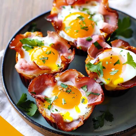 Ham and Egg Cups Recipe - elianarecipes.com Egg Cups With Ham, Ham And Egg Roll Ups, Ham Eggs Cheese Muffin Tin, Ham And Egg Breakfast Cups, Egg Bites With Ham, Ham Egg Cheese Cups, Ham And Egg Bites, Eggs In Muffin Cups, Ham And Egg Recipes