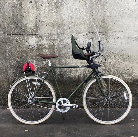 Nicely matched child’s seat to our olive Roadster - we always appreciate our customers’ attention to detail. 📷: @howaychin  #linusbike #bicycle #bike #modern #minimal #design #olivegreen #familybike #sustainableliving Linus Bike, Family Bike, Adventure Bike, Olive Green, Bicycle, Bike, Design