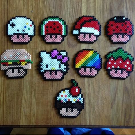 Super Mario mushrooms perler beads Mario Perler Beads, Perler Bead Mario, Hamma Beads Ideas, Easy Perler Bead Patterns, Melty Bead Patterns, Pearl Beads Pattern, Easy Perler Beads Ideas, Fuse Bead Patterns, Art Perle