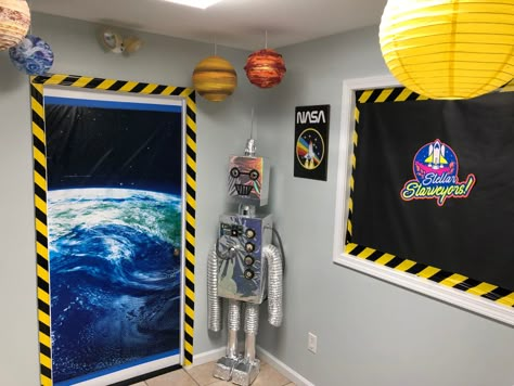 Space Halloween Decorations, Vbs Space Theme Decorations, Space Room Transformation, Space Station Dramatic Play, Elementary Mural, Outer Space Classroom Theme, Diy Spaceship, Outer Space Vbs, Spaceship Door