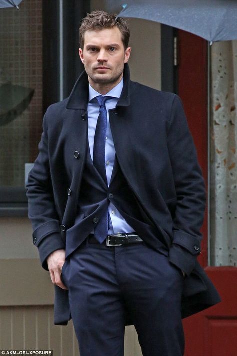 The countdown is on: Fifty Shades fans can look forward to witnessing Jamie's smouldering good looks on screen once again when the film is released next year Christian Gray Fifty Shades, 50 Shades Darker, Christian Grey Jamie Dornan, Fifty Shades Movie, Fifty Shades Freed, Fifty Shades Darker, Mens Winter Coat, Elegante Casual, 50 Shades Of Grey