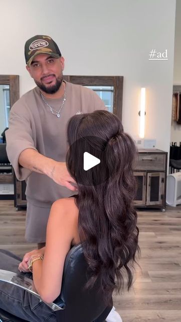 ANTONIO ESTRADA on Instagram: "If you want VOLUME that’ll last all night with your half up half downs, I’m here to show you how to achieve it as a #saloncentricpartner. I take two bobby pins and attach them to a rubber elastic. After styling your half up half down, lift up the pony and place one bobby pin to one side of the base of the pony and reach over to the other side placing your second bobby pin. Once you release the pony you’ll see the instant volume the tension of the elastic created secured at the base of your pony. A simple yet effective hack I love using to really elevate a basic half up half down 🙂‍↕️

MUA @alchemybyisa 

#SalonCentricPartner" Night Out Half Up Half Down Hair, Half Up Half Down Hair Tutorial Videos, Half Up Bun Hairstyles, Half Up Half Down Updo, Half And Half Hair, Half Up Bun, Bobby Pin, Half Up Half Down Hair, Good Hair Day