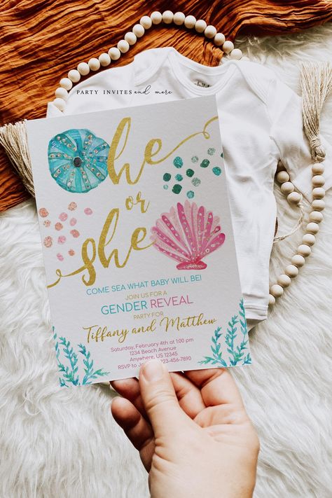 "Gorgeous nautical themed gender reveal invitation with seashells. Beautiful blue and pink color scheme accented with bits of faux gold. Available to edit and download shortly after purchase. We also offer printing to save you time! Matching Items: https://www.etsy.com/shop/PartyInvitesAndMore?ref=seller-platform-mcnav&search_query=2590 Demo Here: https://www.corjl.com/d/29OLH6 Printing available: https://www.etsy.com/listing/1195486270  Welcome to my shop! Please read instructions and details below. Benefits of this instant download: * No software needed! Download and edit instantly from any PC or Mobile Device (yes, you can even use your phone!) * All text is editable with the exception of \"he or she\". - See demo * Text color and sizes can be changed. How it works: You will receive an Gender Reveal Beachy, Gender Reveal Under The Sea Theme, Water Theme Gender Reveal, Poolside Gender Reveal, Surfer Gender Reveal Ideas, Cruise Gender Reveal, Gender Reveal Summer Theme, Beach Gender Reveal Party, Gender Reveal Ideas Ocean Theme