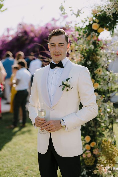 Groom Cream Tuxedo, Grooms In White Tuxedos, Groom Suit Off White, Men’s Wedding Tuxedo White, Grooms Man Outfits Groomsmen, White Tie Wedding Groom, Mens White Suit Jacket Wedding, Ivory Tuxedo Jacket Groom, All White Wedding Groom