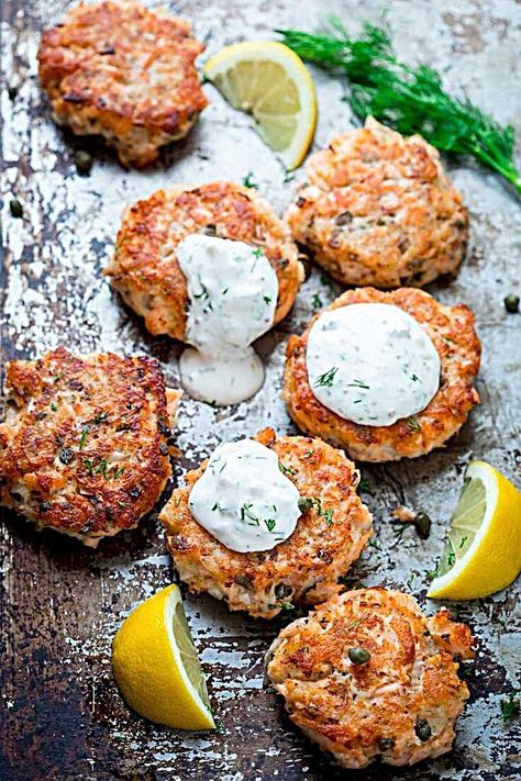 Turn leftover cooked salmon into elegant crispy salmon cakes with lemon zest, capers and light tartar sauce made with Greek yogurt. They're ready in less Lemon Caper Salmon, Cakes With Lemon, Lemon Caper Sauce, Caper Sauce, Fish Recipes Baked, Recipes Fish, Best Seafood Recipes, Salmon Cakes, Fish Recipes Healthy