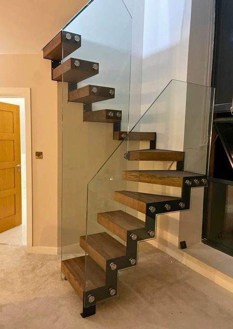 PLEASE CONTACT US BEFORE PLACING AN ORDER U-Shaped Space/ Saving Staircase: Designed to maximise floor space Trying to save on space? This space - saver staircase is a quick and economical means to gain access to a loft, giving the client an extra bedroom or valuable storage space. A 12mm toughened glass panel adds a touch of modern elegance and sophistication, while ensuring the durability and security of your staircase. The clear glass panel amplifies the aesthetic appeal. It is a piece of arc Smallest Staircase, Spiral Staircase Indoor, Suspended Staircase, Staircase For Loft, Semi Spiral Staircase, Space Saving Stairs To Loft, Compact Stairs Space Saving, Stair Ideas For Small Spaces, Stairs To Loft Ideas