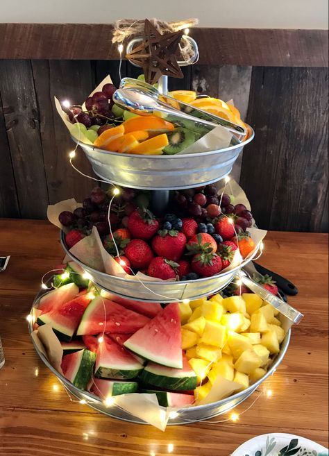 3 Tier Charcuterie Board Ideas, Tiered Tray Party Food Ideas, Galvanized Party Decor Ideas, Cookie Tray Display Ideas Wedding, Tiered Fruit Tray, Fruit Tray Bridal Brunch, 3 Tier Serving Tray Food Ideas, Engagement Party Fruit Platter, Diy 3 Tier Serving Tray Dessert Stand