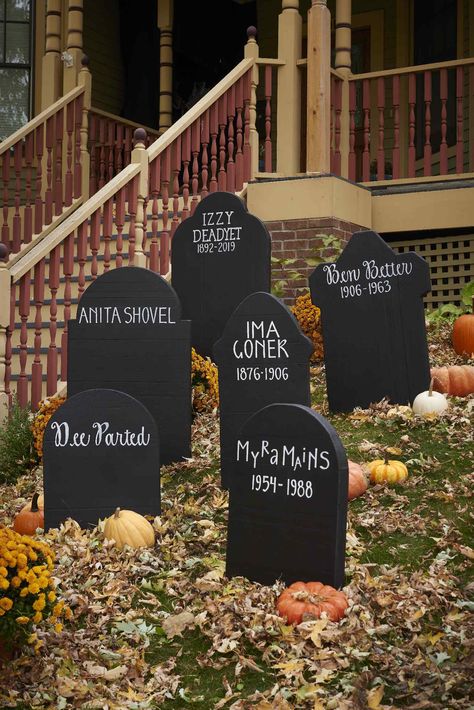 These simple DIY Halloween tombstones require a white paint pen, black paint, and a little inspiration.  #halloween #halloweenideas #diyideas #halloweendiy #bhg Tombstones Diy Halloween, Tombstone Decorations Halloween, Fake Tombstones Diy, Diy Wooden Tombstones Halloween, Foam Board Halloween Projects, Tombstone Ideas Halloween, Fake Graveyard Halloween, Diy Backyard Halloween Maze, Diy Tombstones Halloween Foam